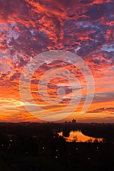 Dramatic colorful sunset over confluence of Danube and Sava river in Belgrade