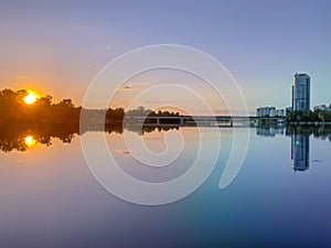 Dramatic colorful sunset over Dnipro river in Kiev, Ukraine. His