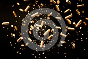 Falling bullets border over black background with light