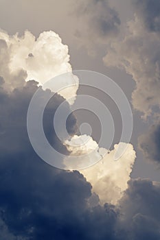Dramatic cumulus clouds forming into violent thunderstorm