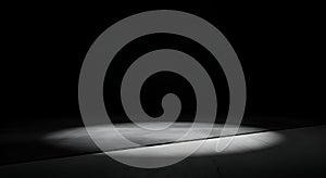 Dramatic spotlight on dark concrete floor render