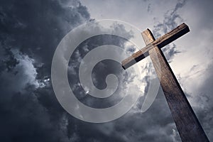 Dramatic cloudscape and wooden cross