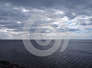 Dramatic dark cloudy sky over the sea