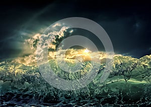 Dramatic dark ocean sea storm view with sun light clouds and waves. Abstract nature background. Climate concept. Extreme weather