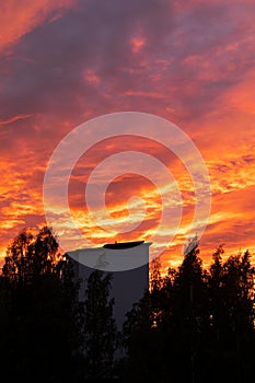 Dramatic fiery sky sunset cloudscape at dusk