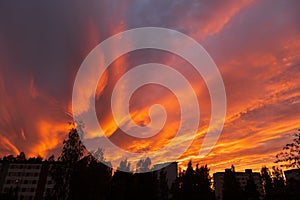 Dramatic fiery sky sunset cloudscape at dusk