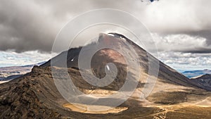 Dramatic grey clouds over volcanic Mount Doom mountains in Tongariro National Park nature in New Zealand Time lapse