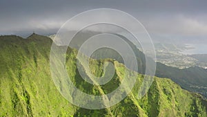 Dramatic Hawaii aerial clouds on sunny sunrise Stairway to Heaven dangerous hike