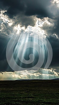 Sun Rays Through Clouds Over Field