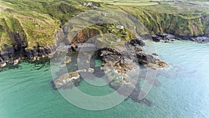 Dramatic landscape of Cornish coast with coves, beaches .