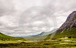 Dramatic landscape by Glencore valley in Scotland photo