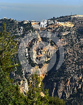 Dramatic landscape, Lebanon, Building set on the top of a cliff at river Nahr Ibrahim canyon