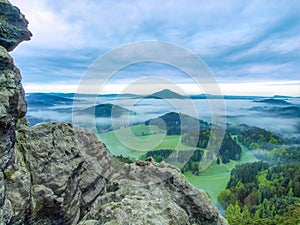 Dramatic landscape before sunrise in hilly landscape