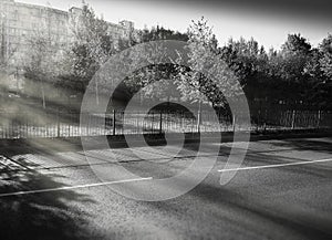 Dramatic light on empty autumn road background