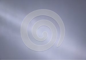 Dramatic light rays on office concrete wall background