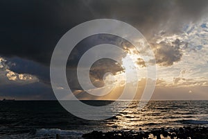 Dramatic Light with Sun Rays and Heavy Clouds