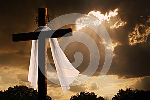 Dramatic Lighting on Christian Easter Cross As Sto