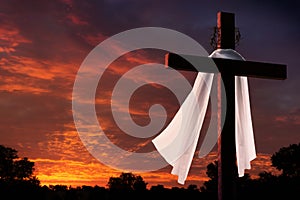 Dramatic Lighting on Easter Cross at Sunrise with Burial CLoth and Crownd of Thorns