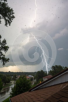 Lightning and thunderstorm flash with raining background