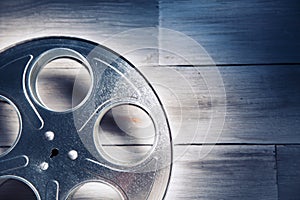 Dramatic lit image of a movie reel