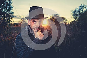 Dramatic man portrait outdoors