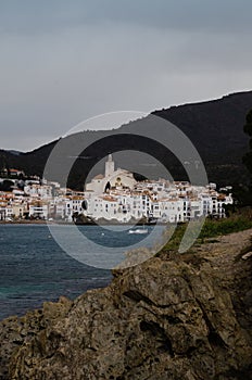 Dramatic and moody shot of the Alt Emporda, Port of Cadaques in Spain on a gloomy day background