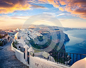 Dramatic morning view of Santorini island. Picturesque spring sunrise on the famous Greek resort Fira, Greece, Europe.