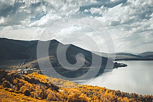 Dramatic mountain lake autumn scene