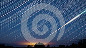 Dramatic Night Sky With Glowing Stars Trails And Meteoric Tracks Trails Rotate Above Countryside Rural Landscape. 4k