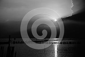 Dramatic ocean with sunset black and white tone