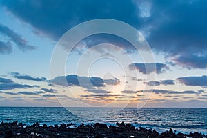 Dramatic ocean view , seascape, sun's rays pass through clouds