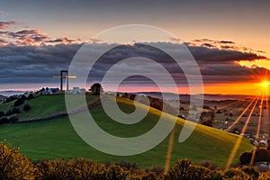 Dramatic Panorama Easter Sunday Morning Sunrise With Cross On Hill