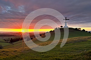 Dramatic Panorama Easter Sunday Morning Sunrise With Cross On Hill