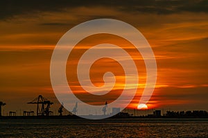 Dramatic panorama evening sky over beautiful port at sunset