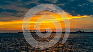 Dramatic panorama evening sky over beautiful port at sunset