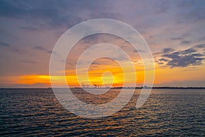 Dramatic panorama evening sky over beautiful port at sunset