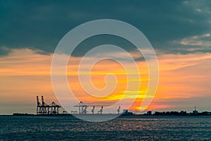 Dramatic panorama evening sky over beautiful port at sunset