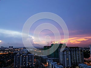 Dramatic pastel evening sky over cityscape of Johor Bahru, Malaysia