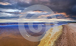 Dramatic and picturesque at sunset scene over the Baltic Sea.