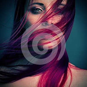 Dramatic portrait attractive girl with red hair