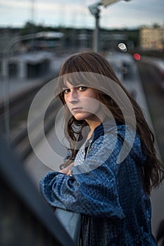 Dramatic portrait of a girl theme at the dark