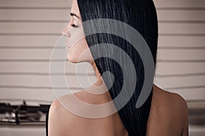 Dramatic portrait of a girl theme: portrait of a beautiful lonely girl isolated on a white background in studio