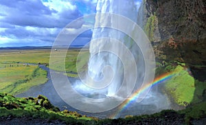 Dramatic Rainbow below Seljalandsfoss Waterfall, Southern Iceland