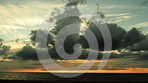 Dramatic red clouds at sunset sky