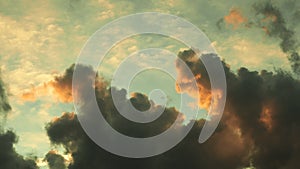 Dramatic red clouds at sunset sky