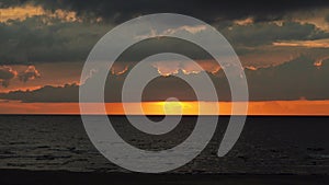 Dramatic red clouds at sunset sky