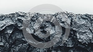 Rugged rocky landscape showcasing textured surfaces under a cloudy sky