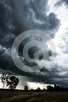 Dark storm clouds on the sky background