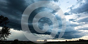 Dark storm clouds on the sky background