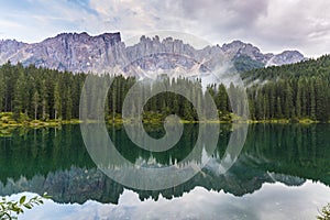 Dramatic scenery in the Dolomite Alps, Italy, in summer, with storm clouds and majestic peaks